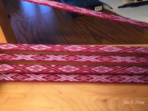 The finished band before taking off the loom.